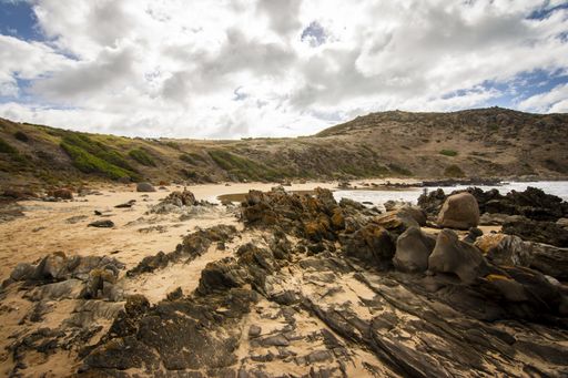 Dramatic shots of Petrel Cove rock & beachscapes a site of past shipwrecks during the whaling ship era.