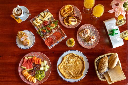 a high angle view of a breakfast table full of food