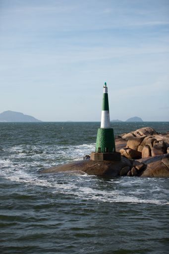 An old lighthouse on a rocky coast