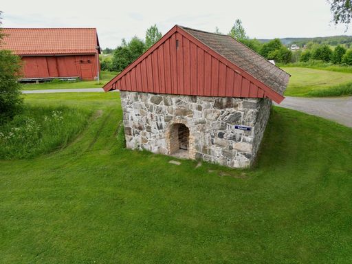 A beautiful shot of a gunpowder house in a field during the day