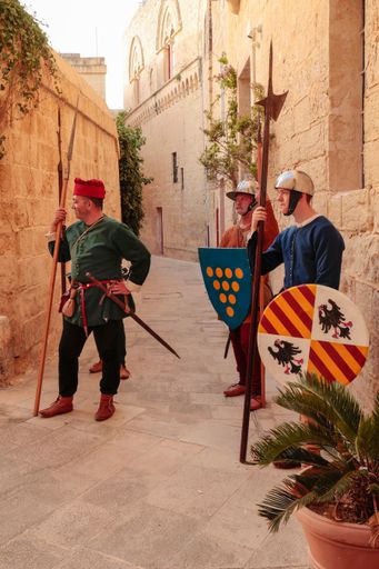 A nobleman Francesco Gatto and his retainers in front of his palace at Mdina, in a reenactment of 15th century life at Mdina, Malta, Mediterranean
