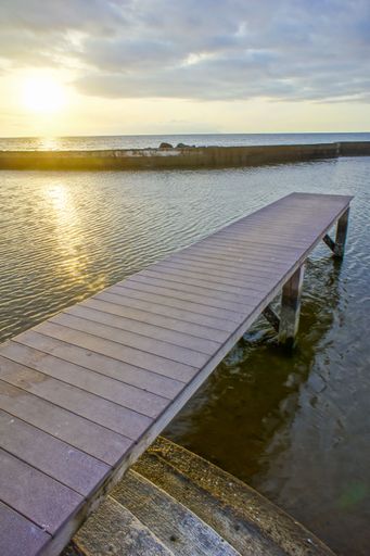 Sunrise on a Pier over Atlantic Ocean in Tenerife Canary Islands Spain