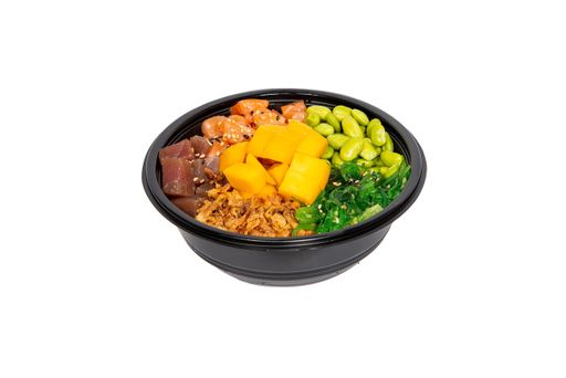 A high angle shot of a black bowl of Japanese Bento with a white background