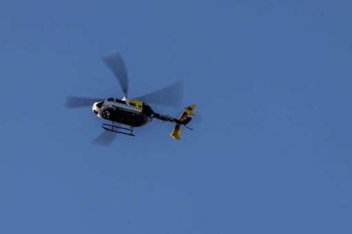 A medical helicopter shortly after taking off from a Boston hospital
