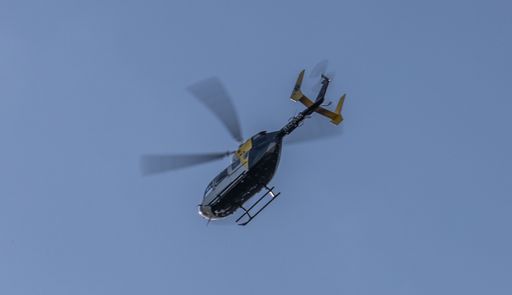 A medical helicopter shortly after taking off from a Boston hospital
