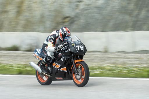 Fast racing motor bike in the track. Yamaha classic