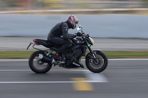 Fast racing motor bike in the track. Yamaha classic