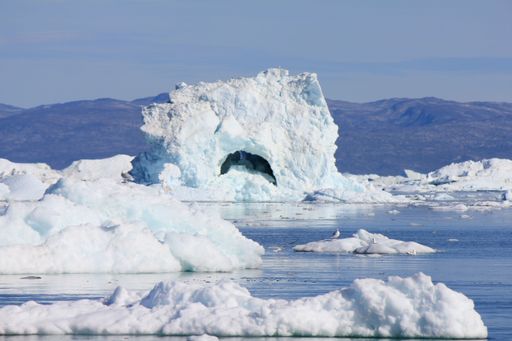 The icebergs floating in the ocean in Ilulissat, Greenland