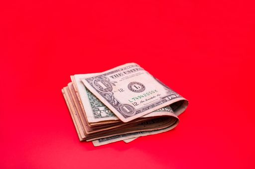A one American dollar isolated on a tred background