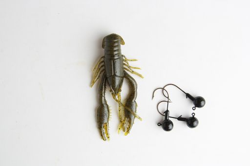 A top view of different fishing lures isolated on a gray surface