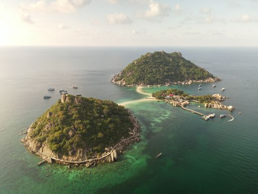 An aerial view of a beautiful sea on a sunny summer day