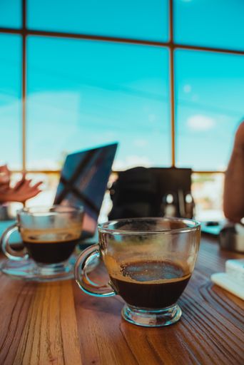 A vertical shot of an espresso co working space