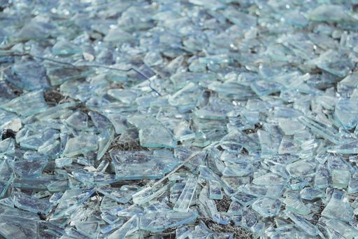 A closeup shot of broken glass pieces