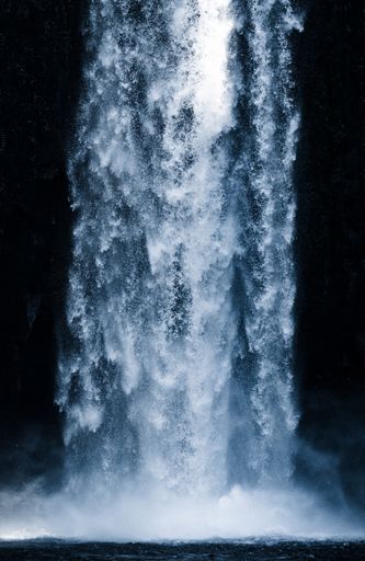 The frozen Abiqua waterfall in winter, Oregon, vertical