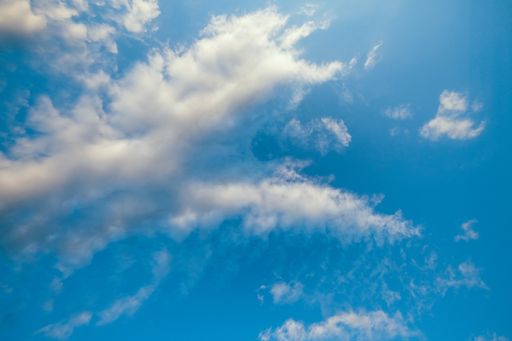 A low angle shot of a beautiful scenic cloudy sky at daytime