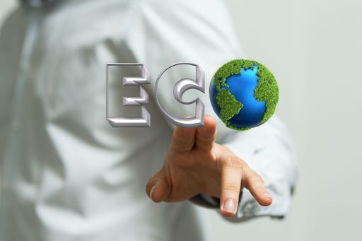 The man touching the 3d transparent ECO word with the globe shape icon. Ecology concept
