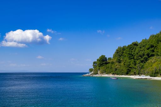 An aerial view of the beautiful calm shore of Skopelos island, Greece
