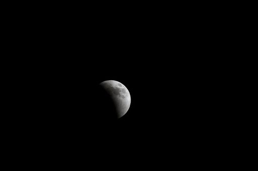 The lunar eclipse at the halfway mark.