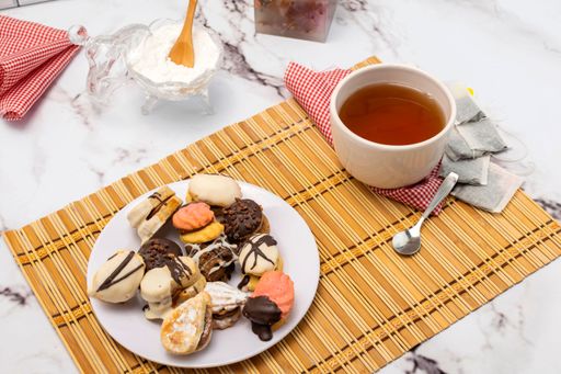 A closeup shot of homemade sweets and a cup of tea