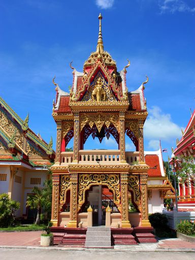 A low angle shot of Wat Chalong temple in Khok Pho District of Pattani Province in Thailand