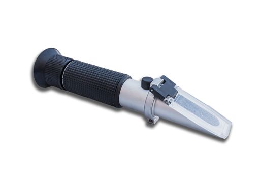 The refractometer portable device for the measurement is Isolated  on a white background