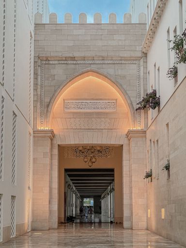 A vertical shot of the gateway of Al Jamea tus Saifiyah in Nairobi, Kenya with shiny marble floors and archways