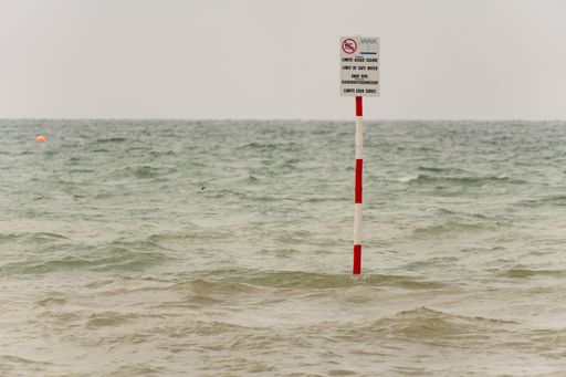 A warning sign in the sea
