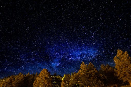 A starry night in the dark sky during nighttime
