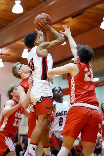 The indoor high school basketball game of Lake Station vs Hebron playing a tournament