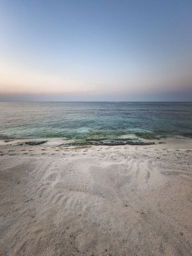 A mesmerizing view of the golden sunset over the sea
