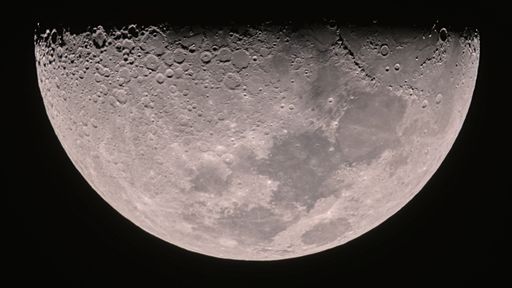 The half moon on a black background