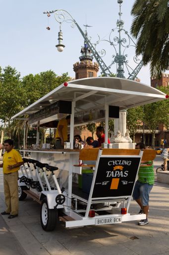 A vertical shot of a cycling Tapas bar in Barcelona, Catalonia, Spain