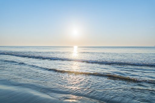A beautiful view of the dusk over water wavy texture