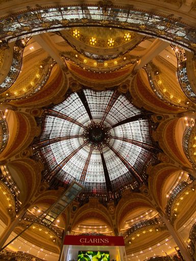 A low angle shot of the Ceiling of the Lafayette luxury shopping mall in Paris