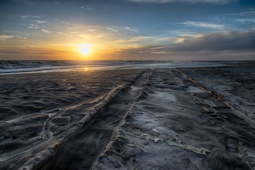 A beautiful scenery of the breathtaking sunset reflected in the sea - great for a cool background