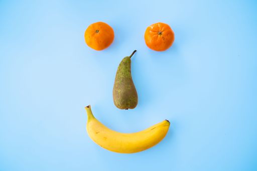 A delicious ripe fruits isolated on a blue background