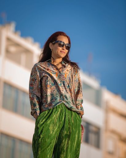 A portrait of a Hispanic female wearing a casual outfit