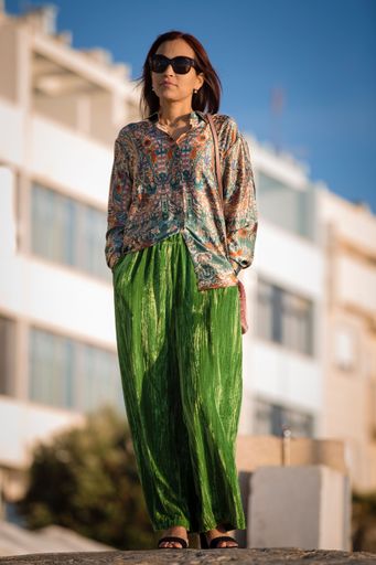 A portrait of a Hispanic female wearing a casual outfit