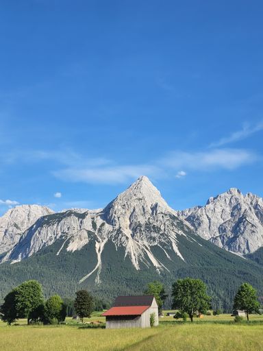 A vertical shot of the scenic Northern Limestone Alps on the borders of Germany and Austria
