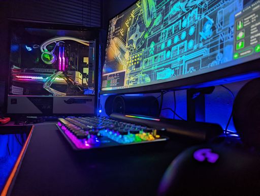 A closeup of custom PC setup with RGB lights.
