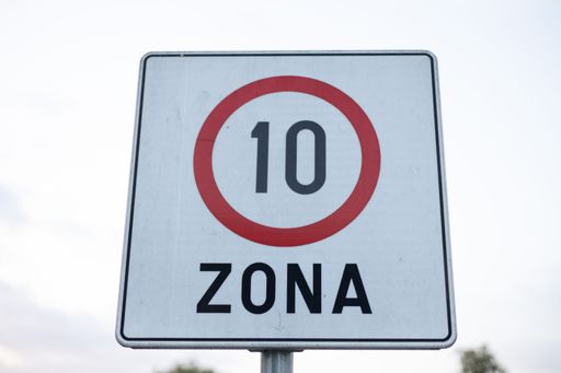 A closeup shot of a restriction road sign for the zone