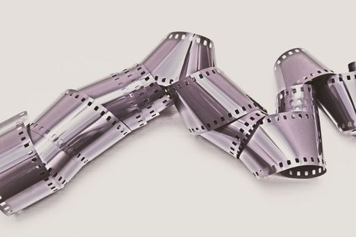 A closeup of 35mm film roll isolated on white background