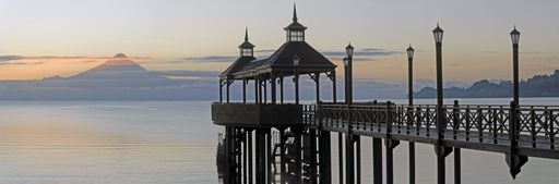 A panoramic shot of the beautiful pier located in Frutillar, Chile during sunset