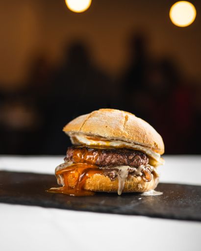 A vertical shot of a delicious freshly made burger