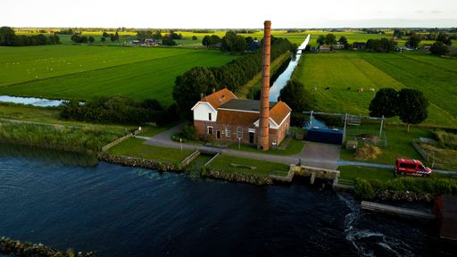 An aerial drone shot of a steam pumping station (Stoomgemaal) near Echtenerbrug, the Netherlands