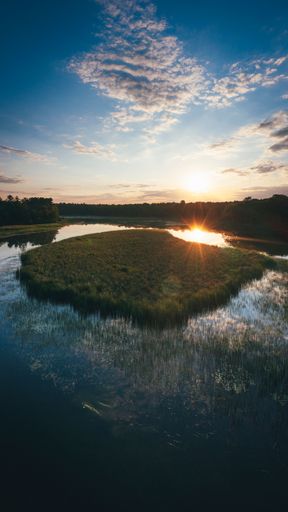 Sun reflecting on water in Northern Michigan at Iargo Springs