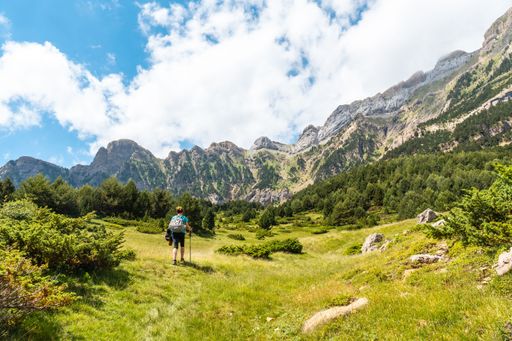 A young woman trekking to the Piedrafita arch in the Pyrenees in Panticosa, Aragon