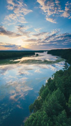 Aerial photo of northern Michigan sunrise over Iargo Springs in Oscoda, MI