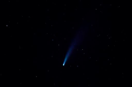 A low angle shot of a Neowise Kite (Shooting Star) captured in the night sky