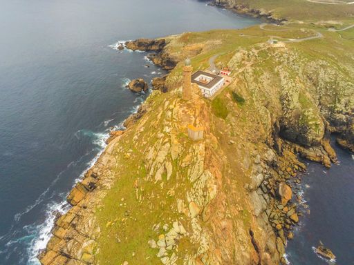 Rocky coast in Galicia. Cape Vilan lighthouse Area. Spain. Drone Photo .